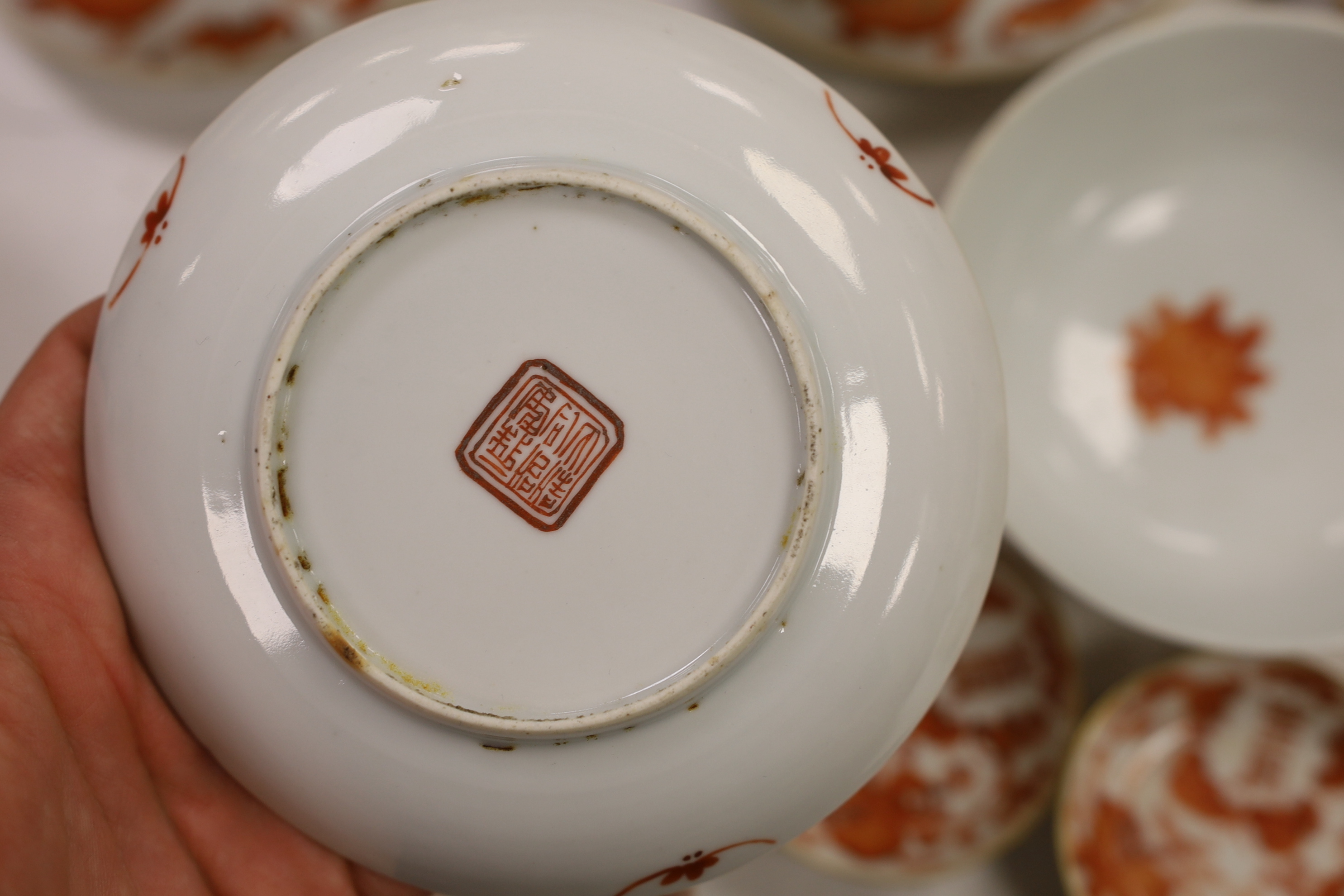 A group of Chinese iron red enamelled ‘sanduo’ bowls, saucers and side dishes, c.1900, Tongzhi and Guangxu marks